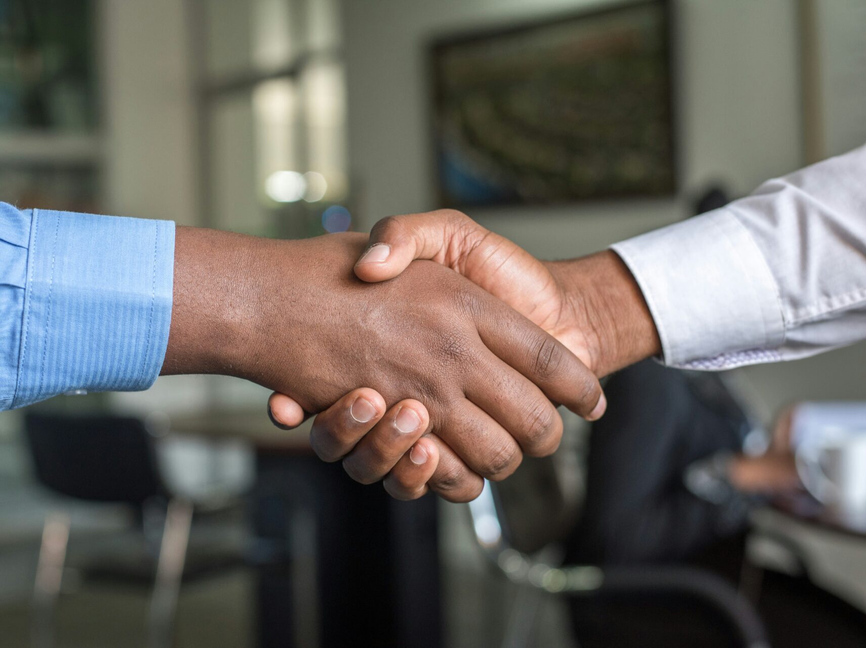 two people shaking hands