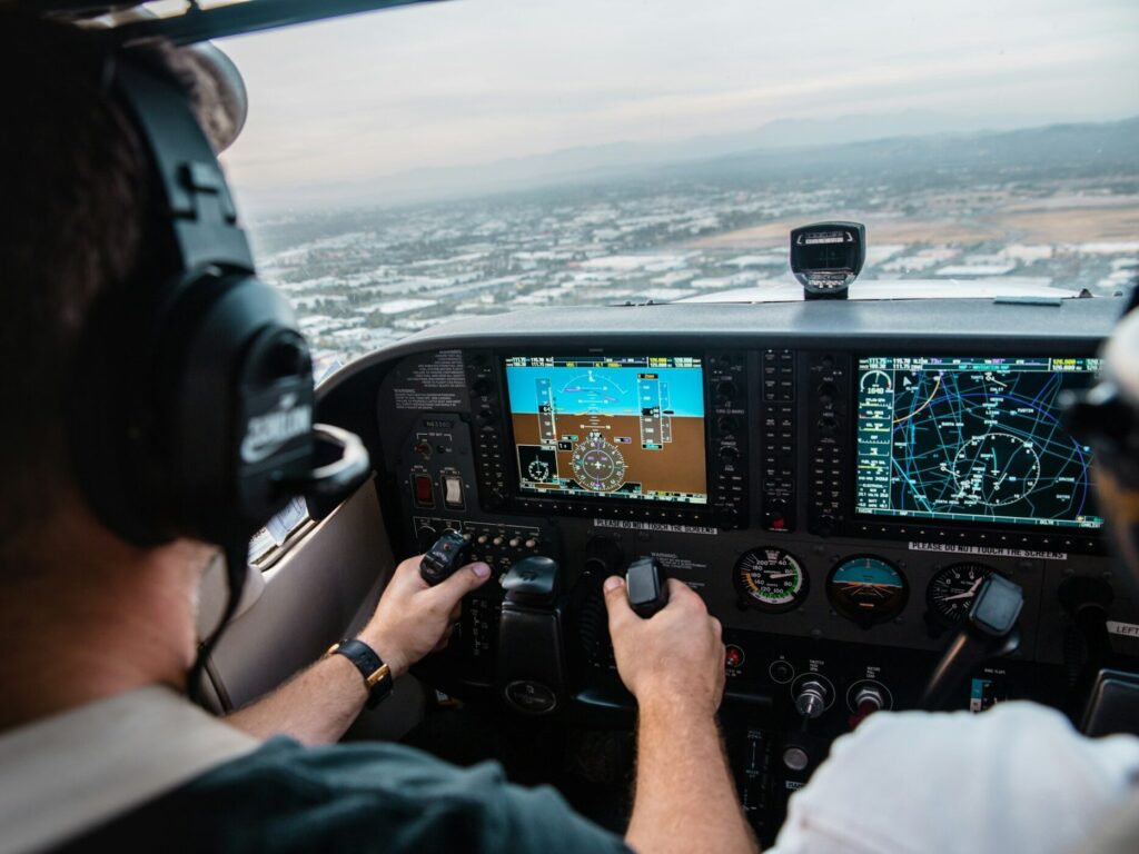 pilot flying a plane