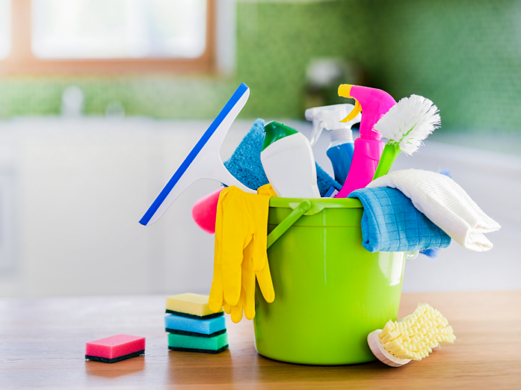 Bucket of cleaning supplies.