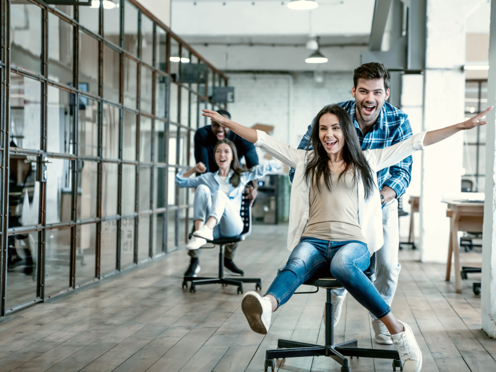 playful office chair races in the workplace