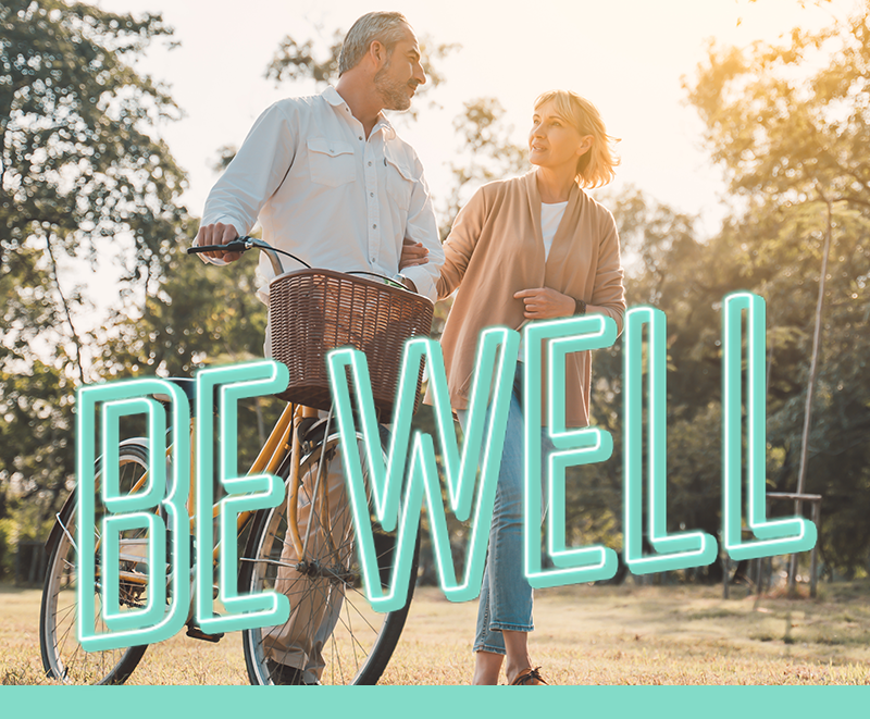 Department Image: BE WELL: Mature couple walking on trail