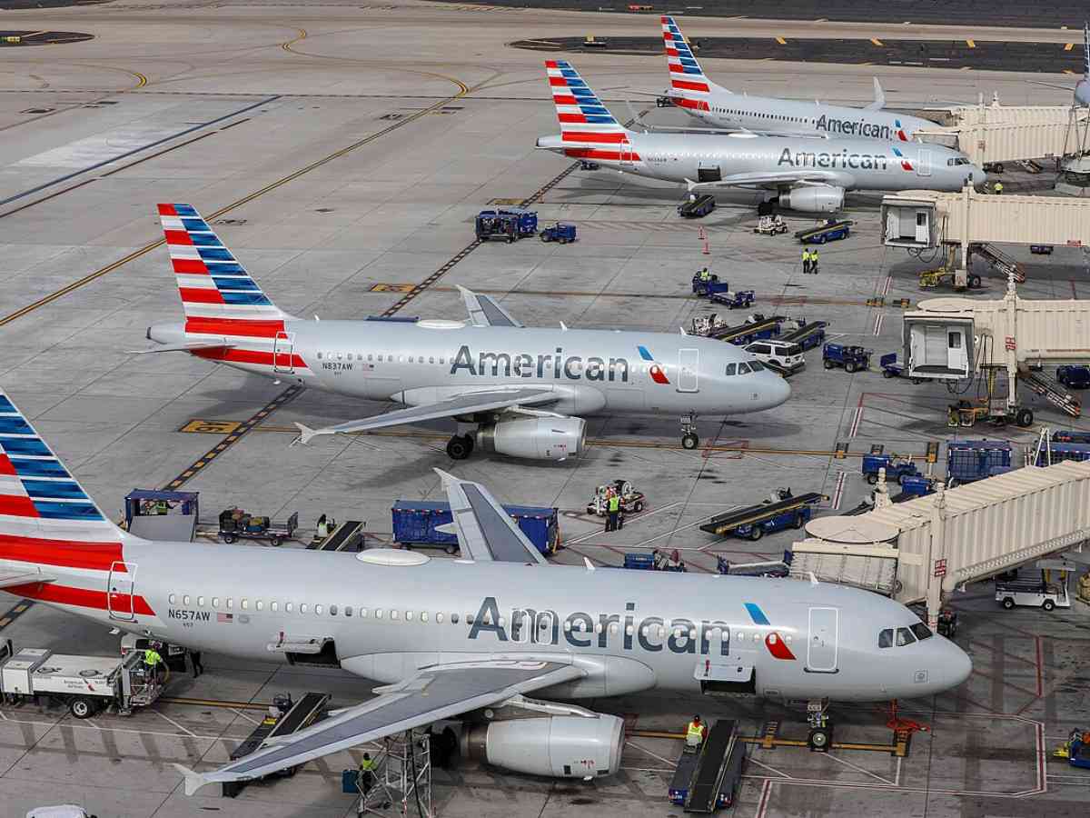 American Airlines planes lined up at terminal for article 20 Largest Employers in DFW for newcomers moving to DFW.