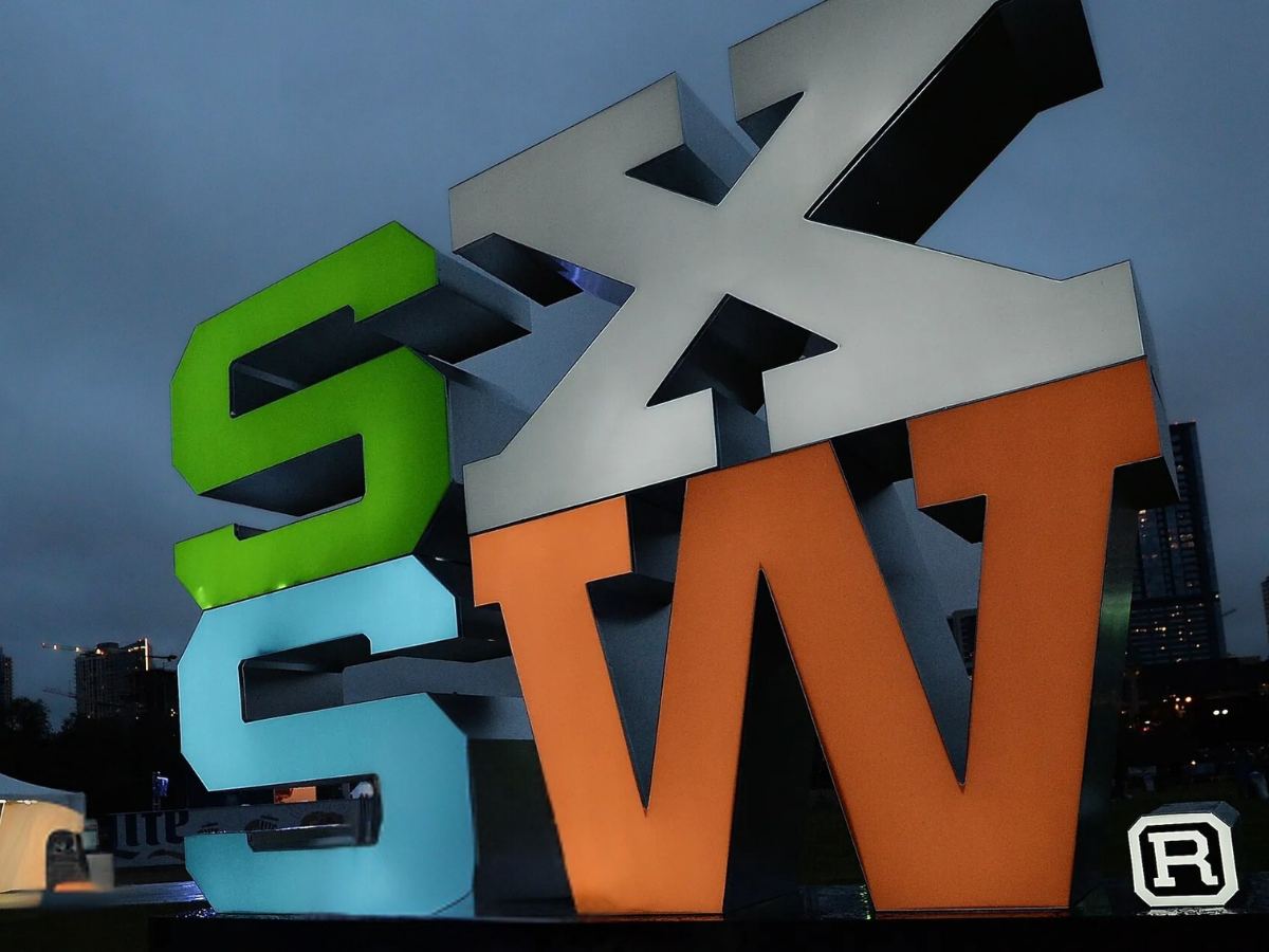 South by Southwest Big colored letters stacked SX on top of SW)for people to pose for pictures in front of at the event for article South by Southwest (SXSW) for newcomers moving to DFW.